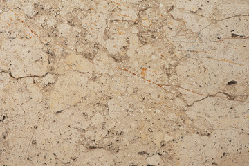 Golden marble texture of a natural white and golden stone tile.