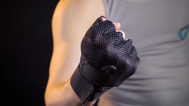 Fighter showing warmup in sport gloves