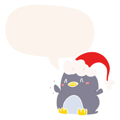 cartoon penguin wearing christmas hat and speech bubble in retro style