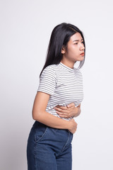Obraz premium Young Asian woman got stomachache.