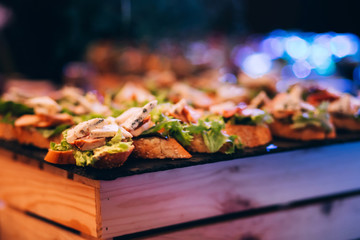 Catering Buffet Food Dish with Meat and Colorful vegetables on a Table