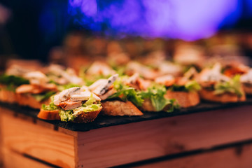 Catering Buffet Food Dish with Meat and Colorful vegetables on a Table