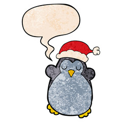 cute christmas penguin and speech bubble in retro texture style