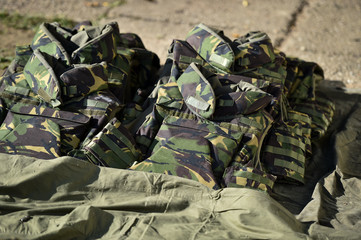 Camouflage bullet proof vest detail