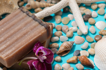 Handmade moisturizing Frankincense & Myrrh Goat's Milk Bar Soap decorated with Pebbles, Sea Stars,...