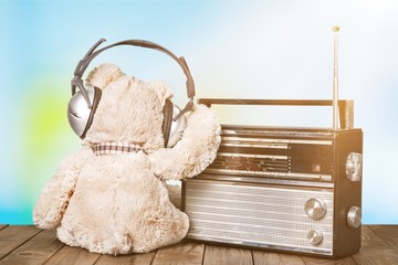 Teddy bear in headphones and radio
