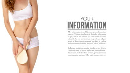 Beautiful woman brush from cellulite in hands, sample text on a white background. Isolation