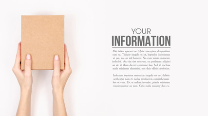Box in hand, sample text on white background isolation