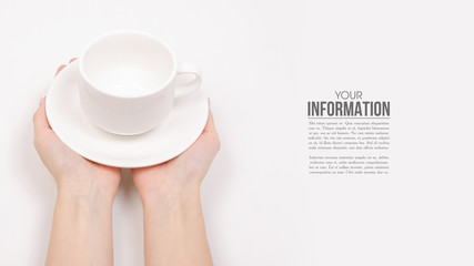 White saucer cup in hand, sample text on white background isolation