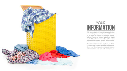 Yellow laundry basket with clothing, sample text on white background isolation