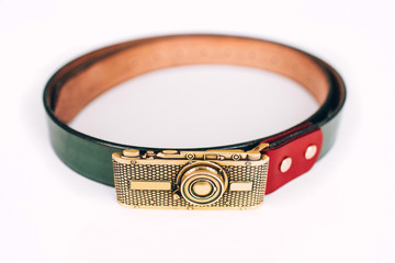 leather belt with a buckle on white, clipping path included. Metal buckle in the form of a retro...