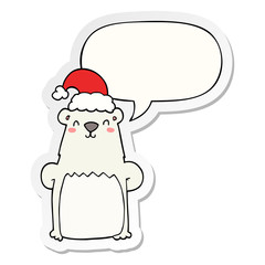 cartoon bear wearing christmas hat and speech bubble sticker
