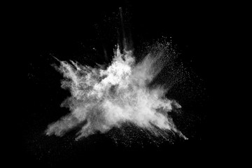 Fototapeta premium White powder explosion on black background. Colored cloud. Colorful dust explode. Paint Holi.