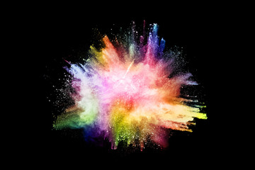 abstract colored dust explosion on a black background.abstract powder splatted background,Freeze motion of color powder exploding/throwing color powder, multicolored glitter texture.