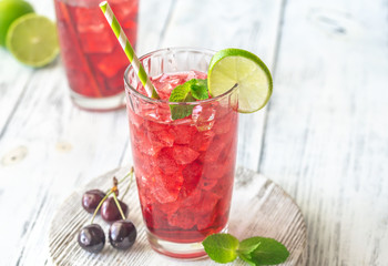Two glasses of cherry mojito