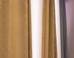 Fototapeta premium curtain folds perspective photography of calming colors interior window decor background 