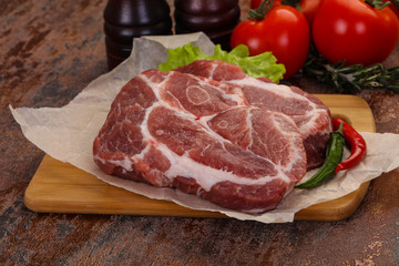 Raw pork neck steak