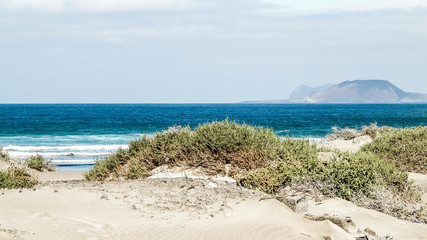 Beach and Atlantic Ocean in Caleta de Famara, Lanzarote Canary Islands. © Jan