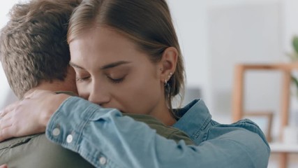 sad woman hugging boyfriend young couple having relationship issues embracing emotional trouble sharing bad news 4k