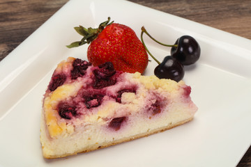 Cheesecake with cherry served strawberry