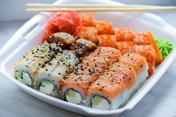 home delivery of fast food: sushi with fish and rice