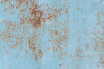 Rusty metal texture with scratches and cracks. paint traces. Blue, white and grey colors. Copy space