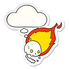spooky cartoon flaming skull and thought bubble as a printed sticker