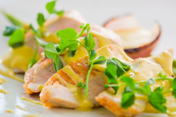 Chicken breasts with zucchini, onion and pistachio pasta