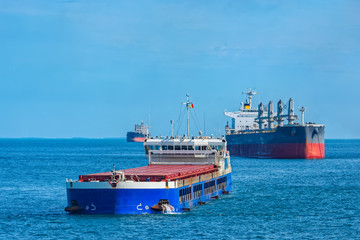 Bulk carrier vessels at outer anchorage of Kamsar port, Guinea, West Africa.
