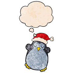 cute christmas penguin and thought bubble in grunge texture pattern style