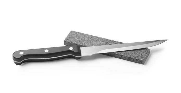 Sharp fillet knife with grindstone isolated on white