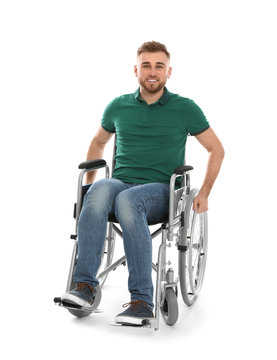 Handsome Young Man In Wheelchair Isolated On White