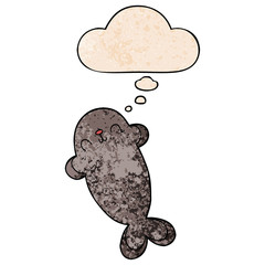 cartoon seal and thought bubble in grunge texture pattern style