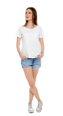 Fototapeta premium Young woman in t-shirt on white background. Mock up for design