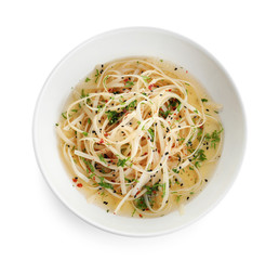 Plate of noodles with broth and herb isolated on white, top view