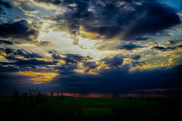 sunset over the lake. It will rain soon.