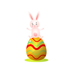 Cute happy red easter rabbit stay on big colorful egg