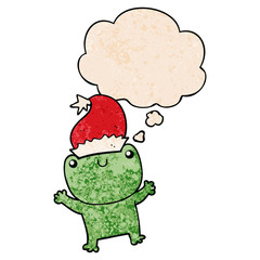 cute cartoon frog wearing christmas hat and thought bubble in grunge texture pattern style