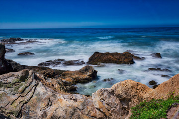 Fototapeta na wymiar Rocky Coastline with Waves, Ocean, Rocks