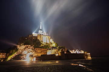 Fototapeta na wymiar Spectacular night illumination of Mont St Michel