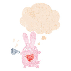cute cartoon rabbit with love heart and coffee cup and thought bubble in retro textured style