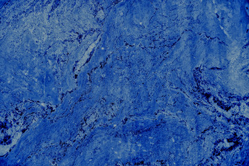 Close up of abstract blue granite stone texture