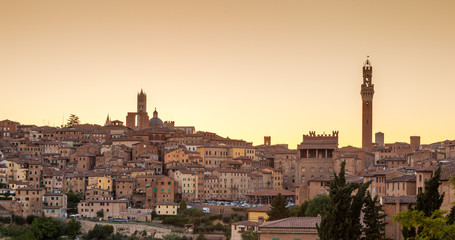 Cityscape of Siena at sunset, Siena, Tuscany, Italy - obrazy, fototapety, plakaty
