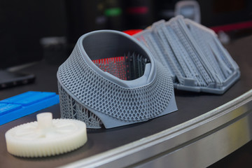 Variety of plastic products manufactured by 3D printing. Technologies