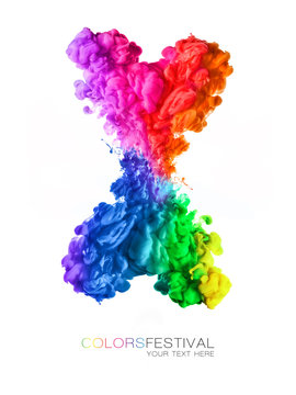 Explosion of rainbow colored acrylic ink in water. Festival of colors