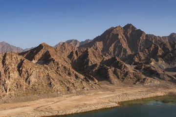 Fototapeta na wymiar Hatta Dam Lake scenery in eastern Dubai, United Arab Emirates