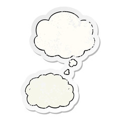 cartoon cloud and thought bubble as a distressed worn sticker