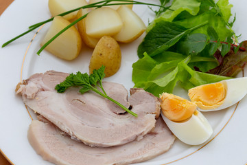 Cold pork meat and salad dinner