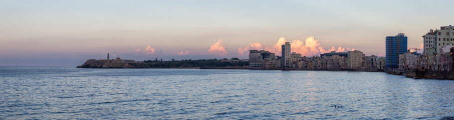 Panoramic view of the Old Havana City, Capital of Cuba, during a colorful cloudy sunset.