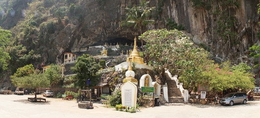 Yathaypyan Cave with golden Buddha statues near Hpa-An, Myanmar / Burma.